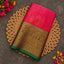 Rani pink Vaira Oosi saree with bottle green zari border
