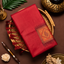 Red soft silk saree with orange Meena work pallu and red tassels