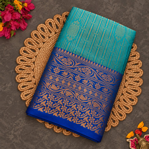 Turquoise Vaira Oosi saree with royal blue zari border