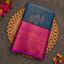 Peacock blue Vaira Oosi saree with magenta zari border