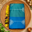 Turquoise teal with blue premium Kolam saree with contrast border and tassels