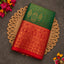 Bottle green Vaira Oosi saree with red zari border