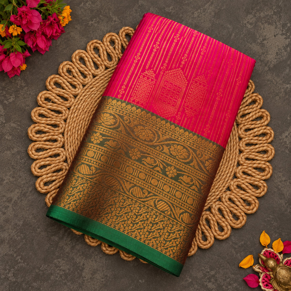 Rani pink Vaira Oosi saree with bottle green zari border