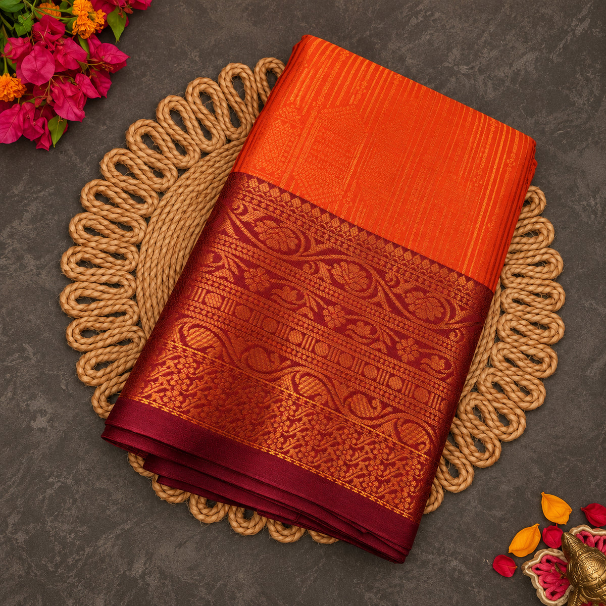 Orange Vaira Oosi saree with maroon zari border