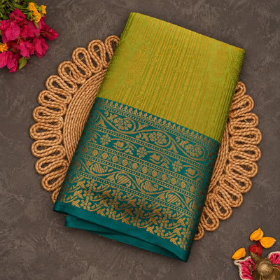 Vaira Oosi Saree | Mehendi Green with Teal Border