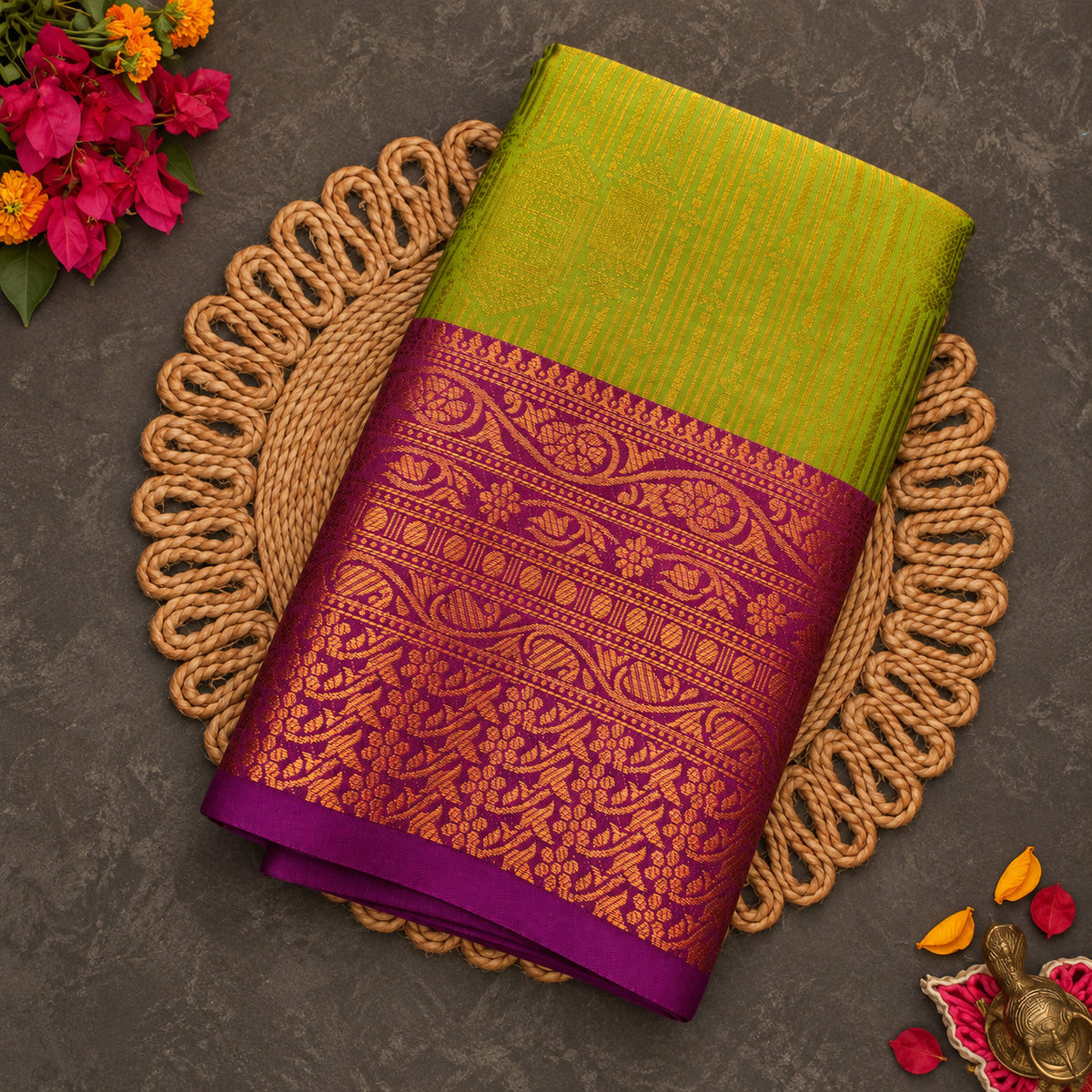 Mehendi green Vaira Oosi saree with magenta zari border