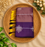 Rust orange with purple premium Kolam saree with contrast border and tassels